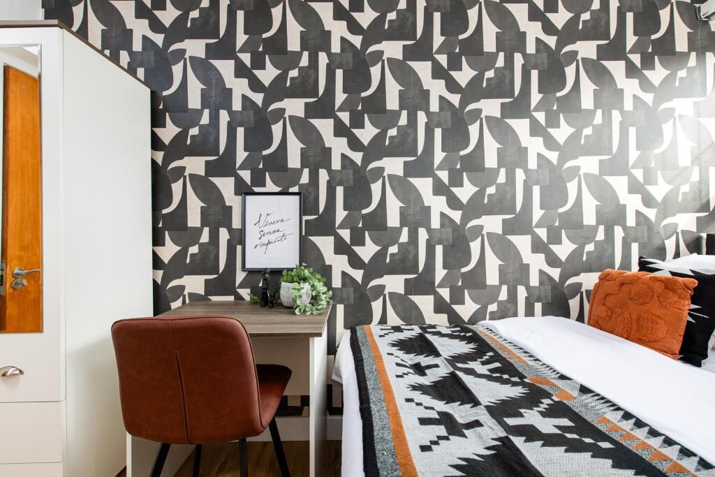 Property photo 3 of 7 A Stylish Double Bedroom Featuring A Bold Patterne...