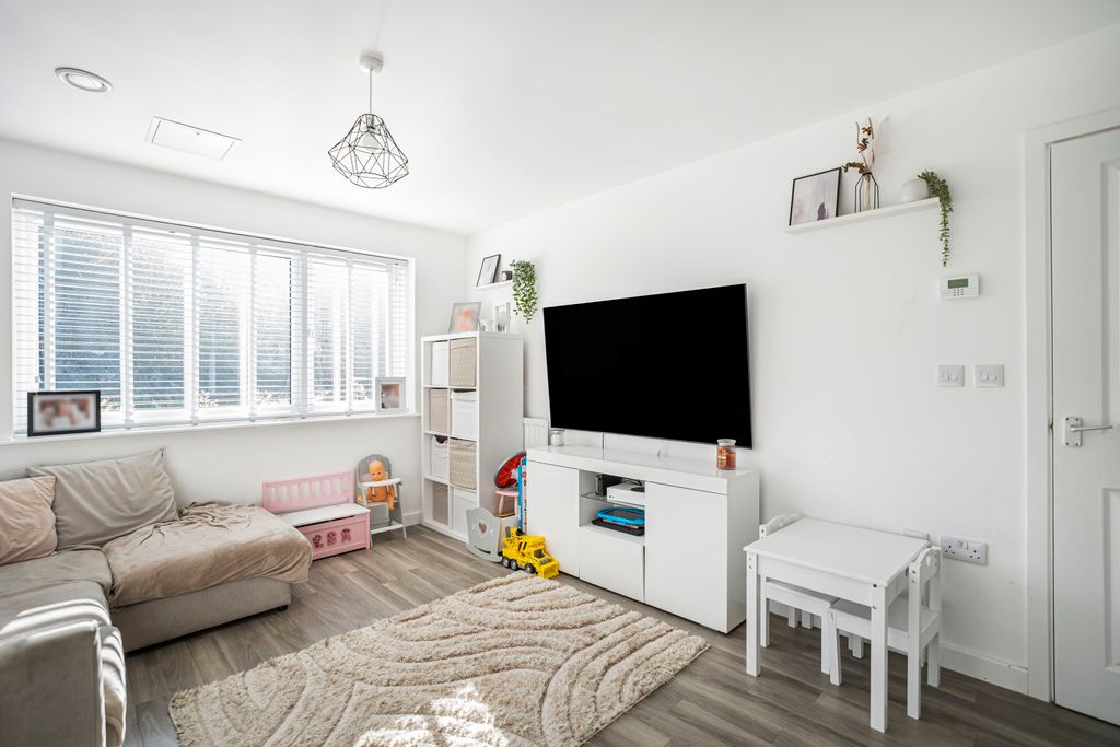 Property photo 2 of 12 Living Area