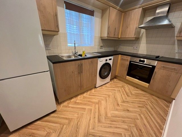 Property photo 3 of 7 Kitchen
