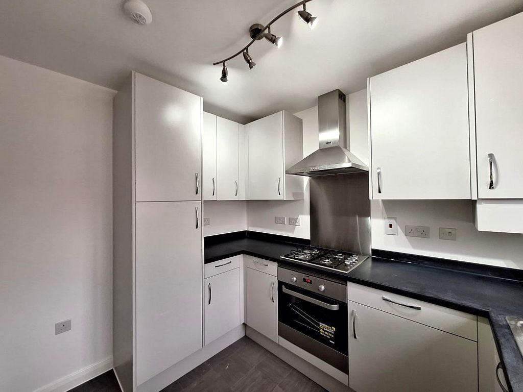 Property photo 3 of 17 Typical Kitchen