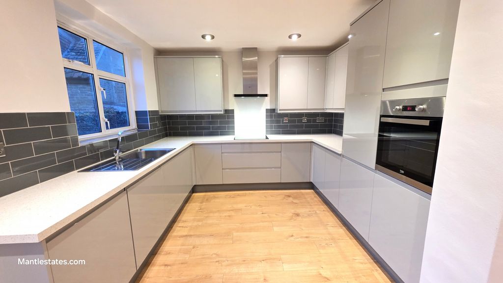 Property photo 2 of 16 Kitchen Area