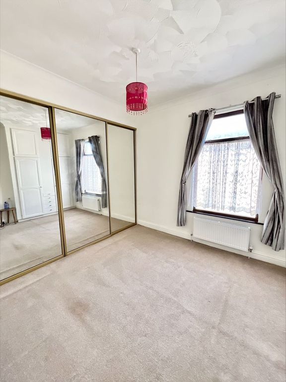 Property photo 1 of 8 Front Bedroom 1