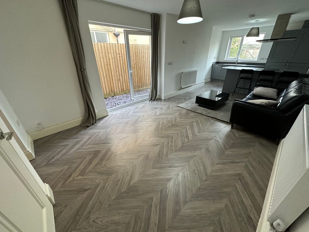 Property photo 2 of 15 Living Area