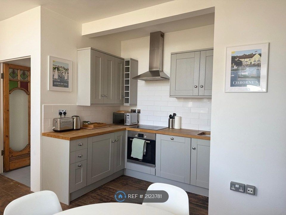 Property photo 3 of 14 Kitchen Leading To Living Room