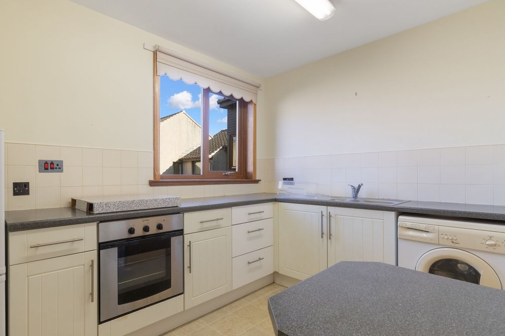 Property photo 2 of 12 Kitchen