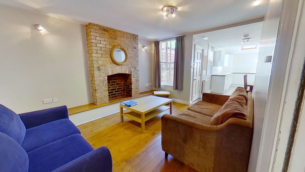 Property photo 1 of 10 Bright, Modern Living Room With Exposed Brick Fire...