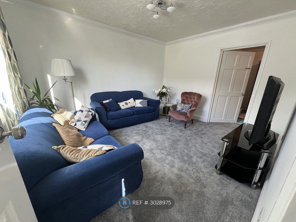 Property photo 2 of 14 Living Room With Access To Dining And Hallway