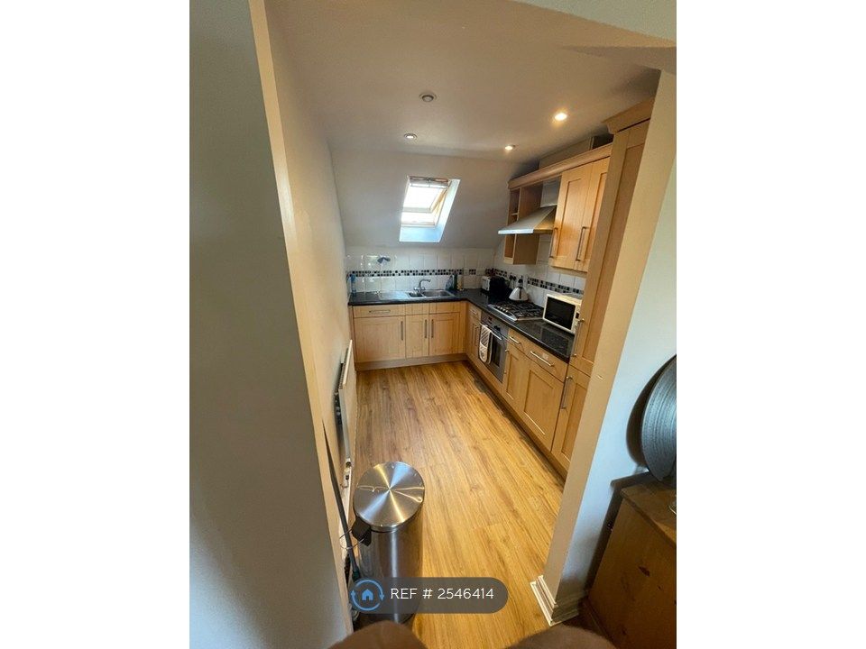 Property photo 2 of 16 Kitchen Connects To Living Room
