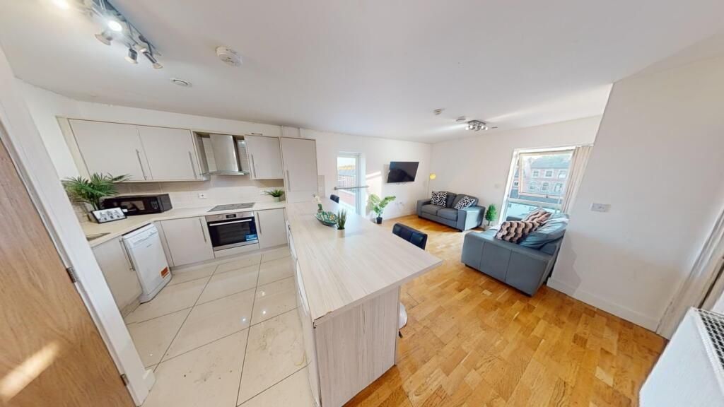 Property photo 3 of 11 A Bright And Modern Open-Plan Living Area With A c...