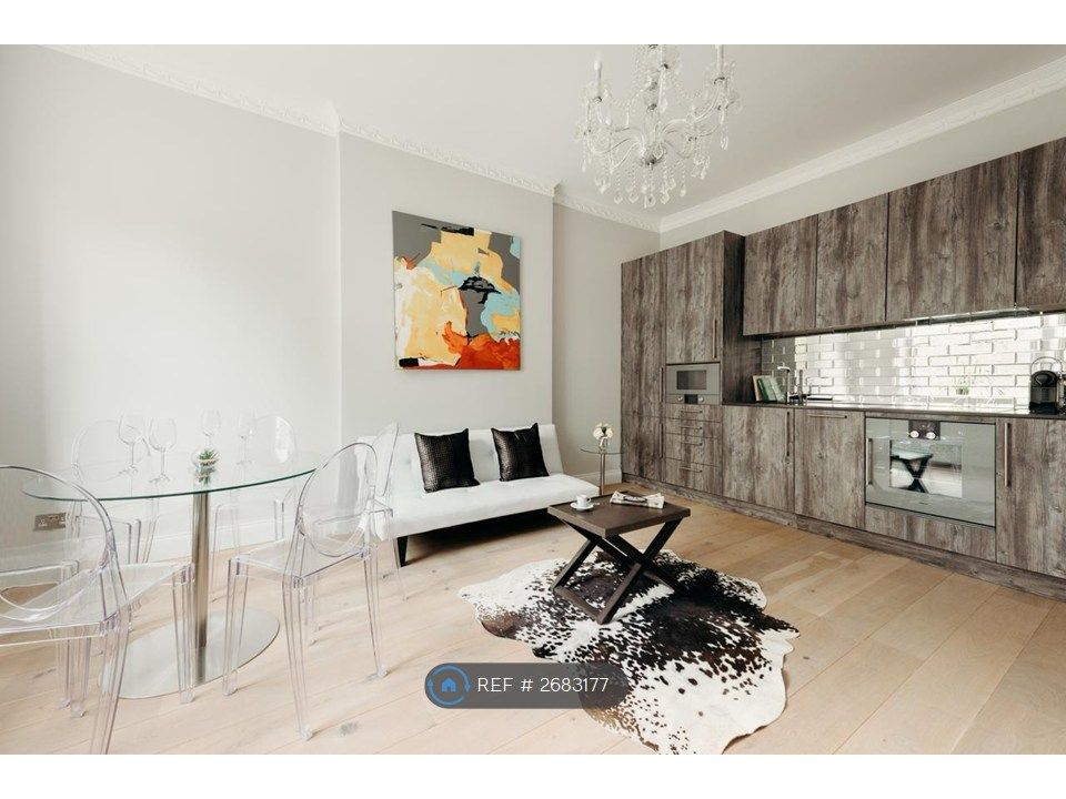 Property photo 2 of 7 Kitchen Area