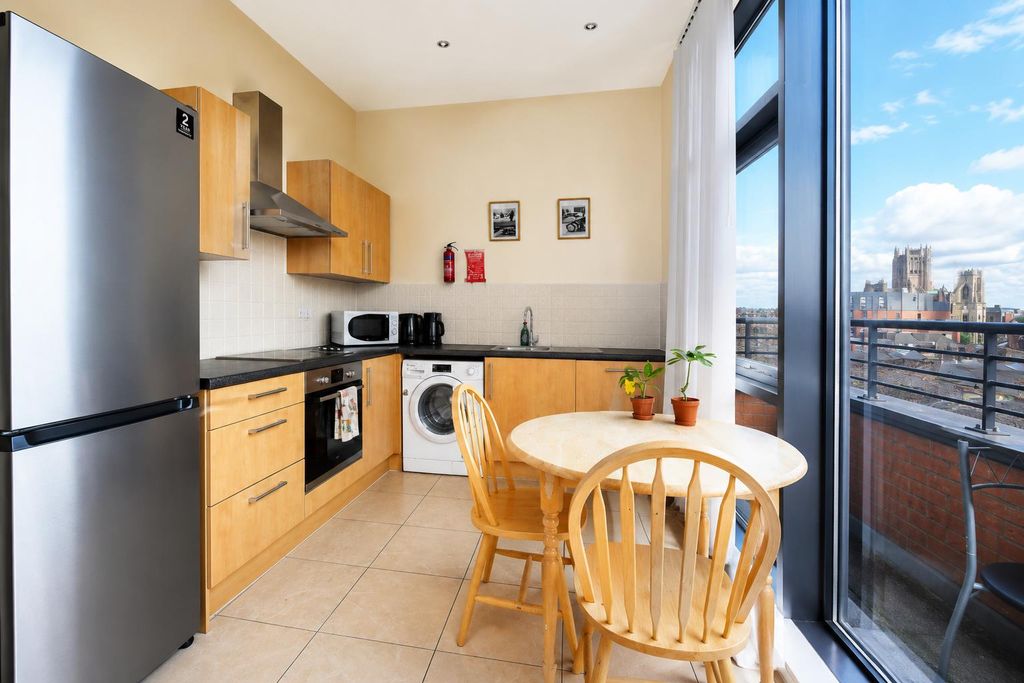 Property photo 2 of 10 Dining Kitchen.Png