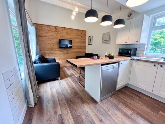 Property photo 1 of 9 Bright And Modern Living Room With An Open-Plan Ki...