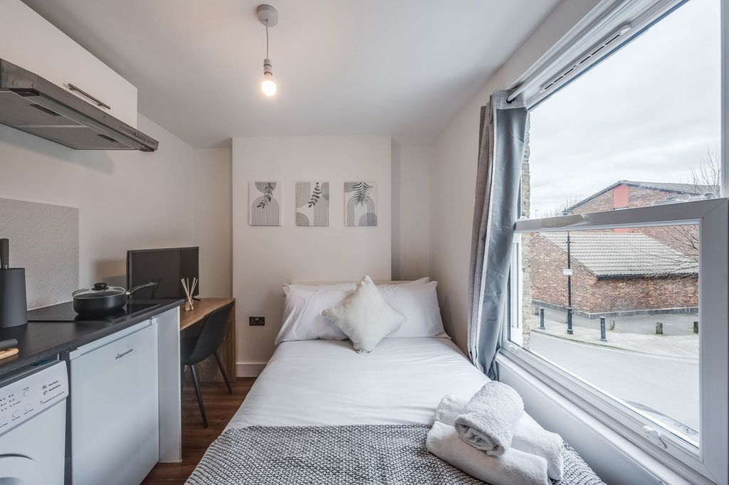 Property photo 1 of 12 A Cozy Double Bedroom Featuring A Comfortable Bed,...