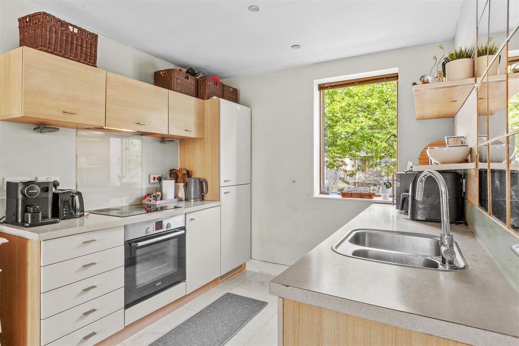 Property photo 3 of 12 Kitchen