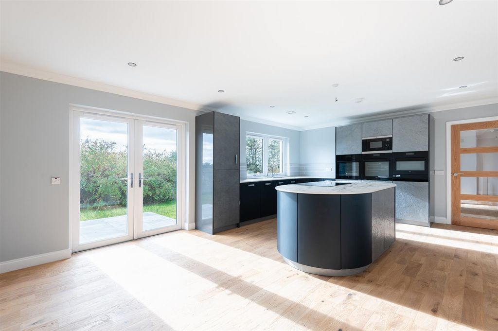 Property photo 3 of 30 Lev1391Seg Dining Kitchen.Jpg