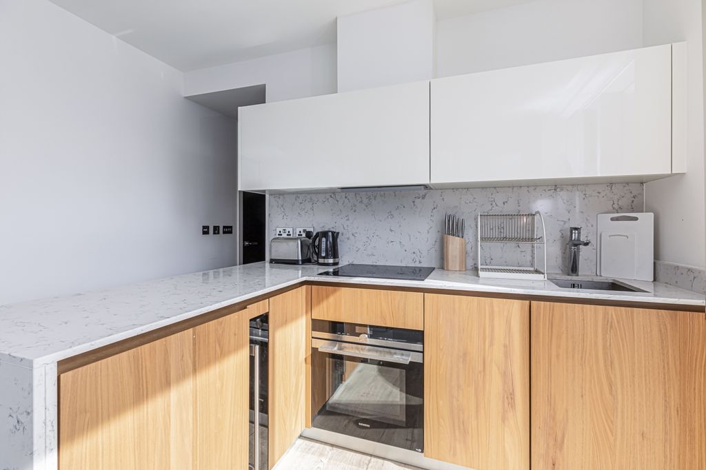 Property photo 3 of 9 Kitchen