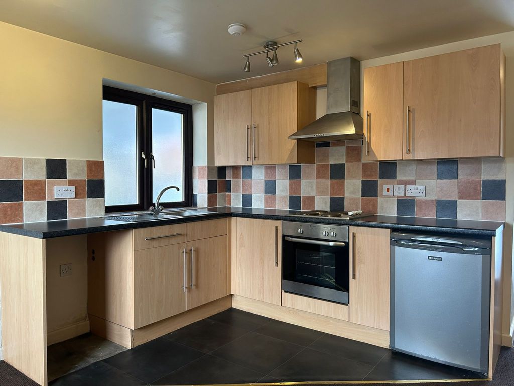 Property photo 2 of 6 Kitchen