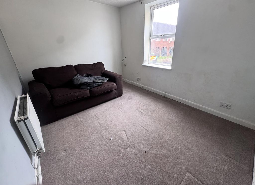 Property photo 3 of 4 Living Area