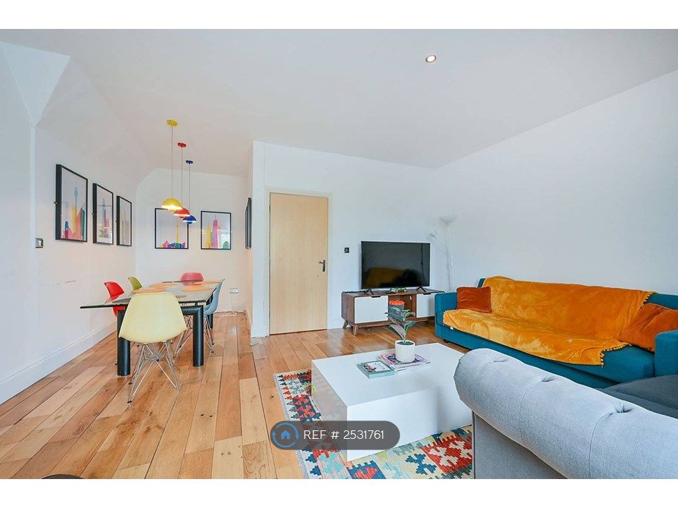 Property photo 3 of 9 Living + Dining