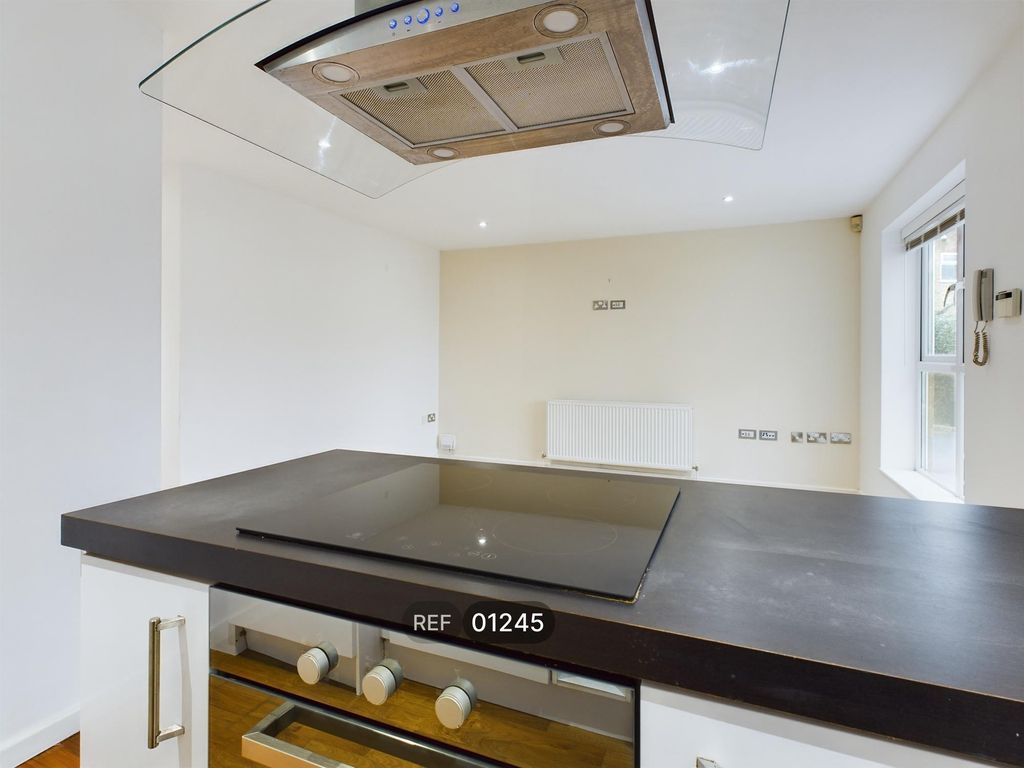 Property photo 3 of 17 Kitchen &amp; Living Area
