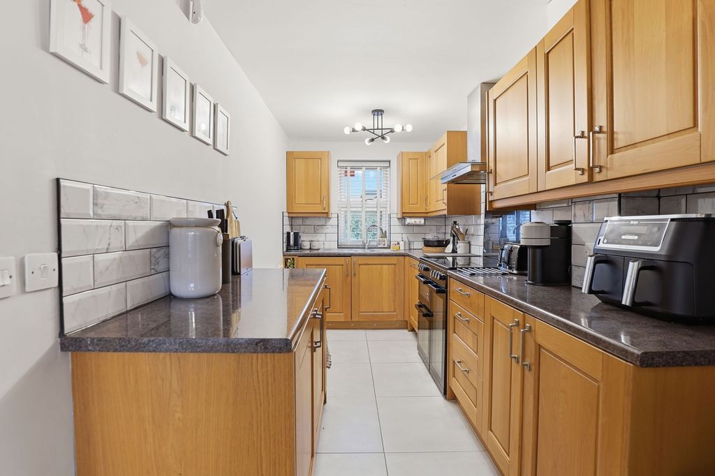 Property photo 2 of 15 Kitchen Area