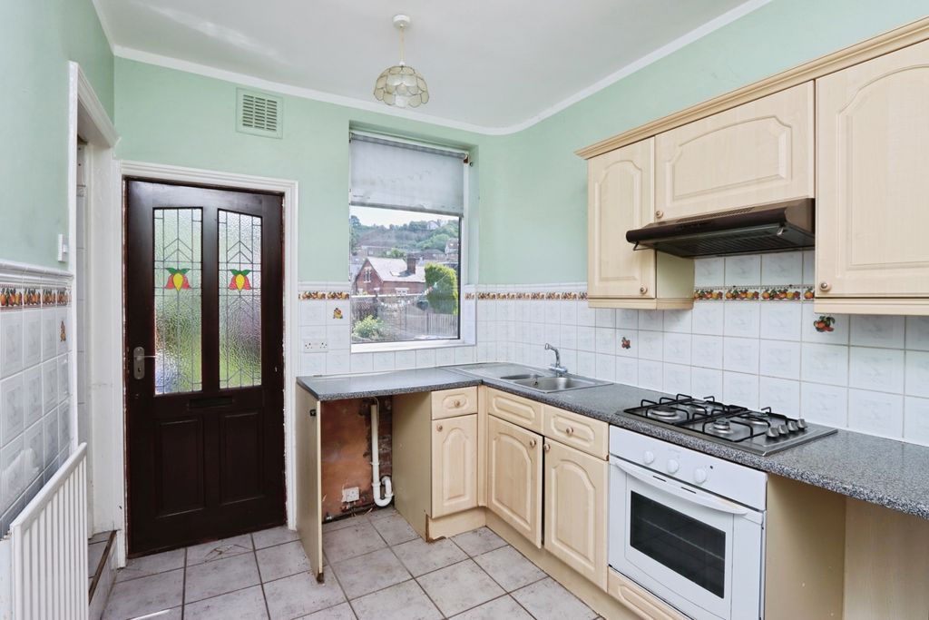 Property photo 3 of 12 Kitchen