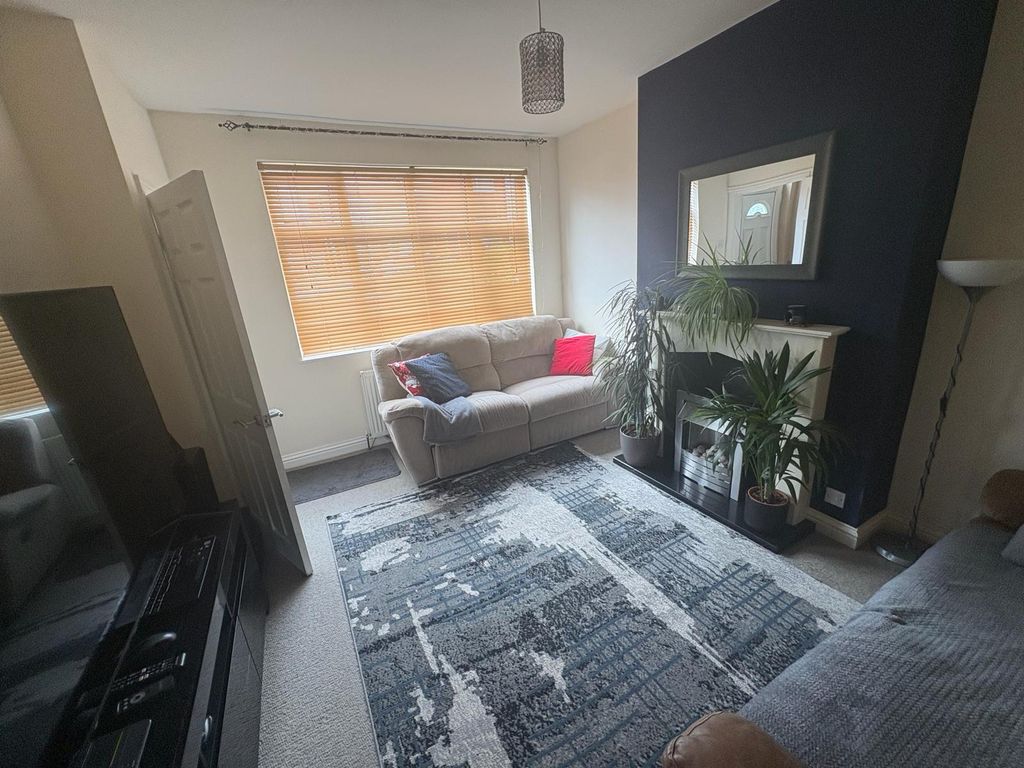 Property photo 3 of 11 Living Area