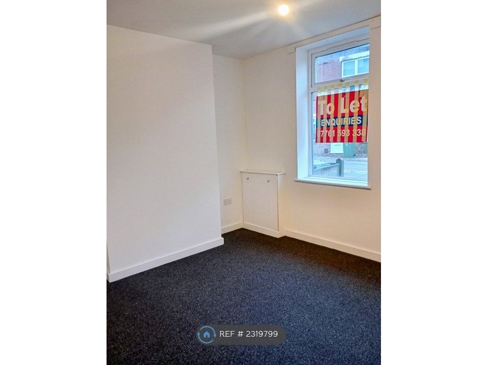 Property photo 3 of 10 Front Living Room