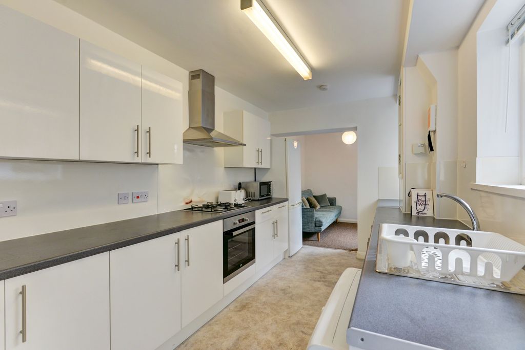 Property photo 3 of 15 Bright And Modern Kitchen With Ample Counter Space...
