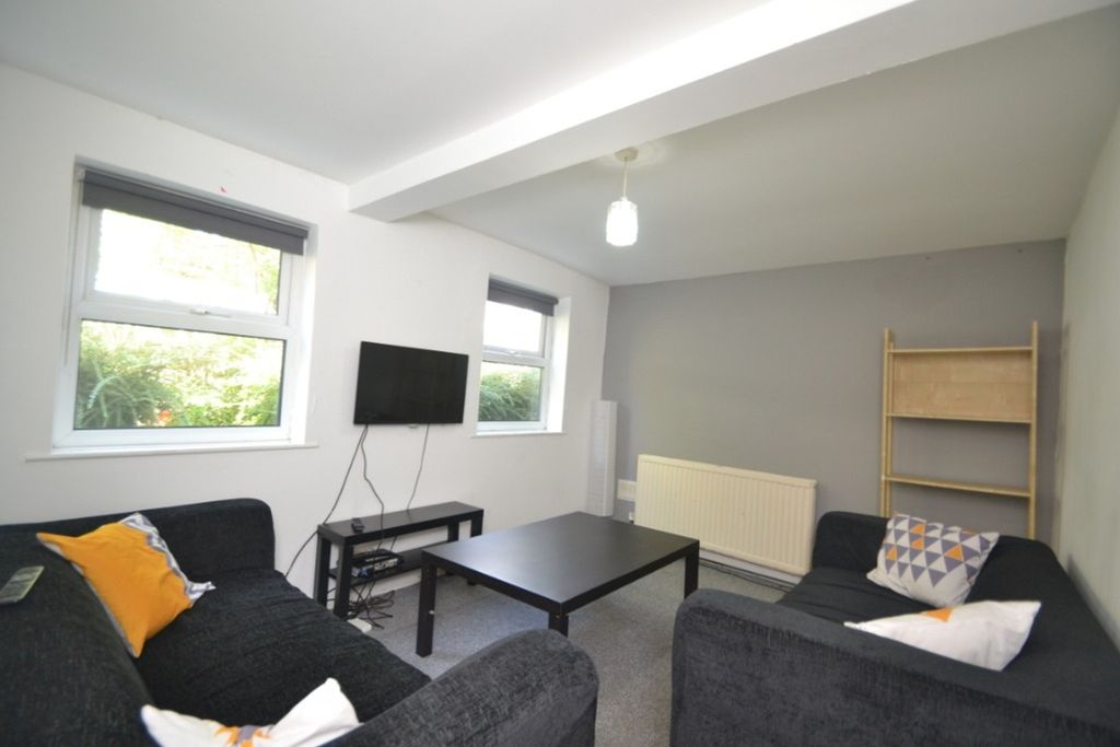 Property photo 2 of 35 Spacious And Inviting Living Room With Abundant Na...