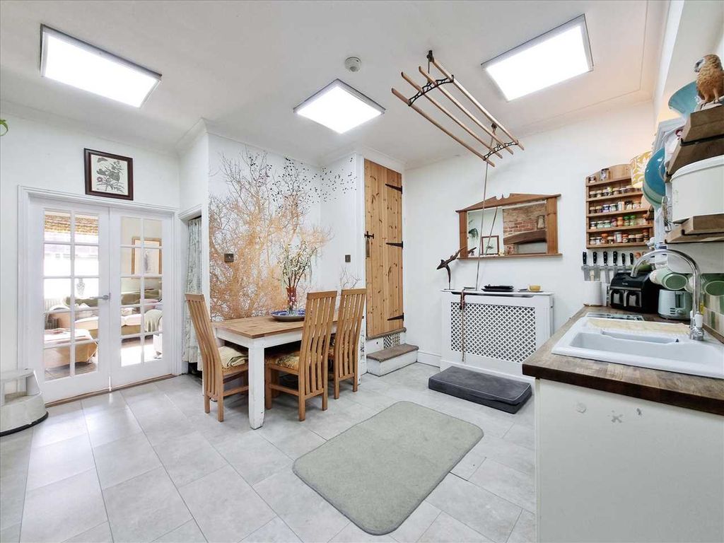 Property photo 3 of 10 Dining Kitchen: