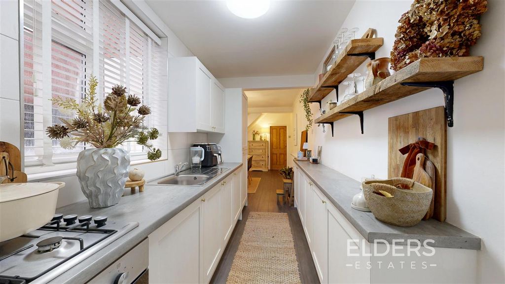 Property photo 3 of 13 Kitchen