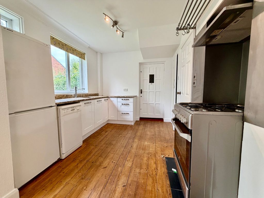 Property photo 3 of 13 Kitchen Area