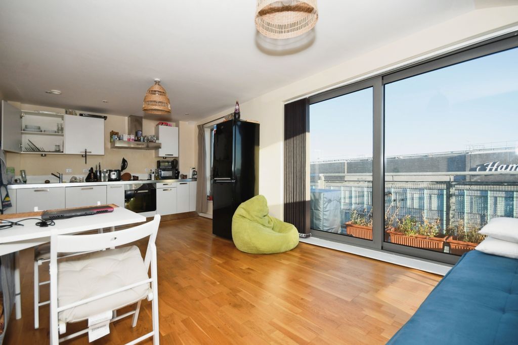 Property photo 3 of 16 Living Area