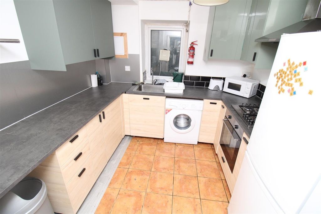 Property photo 1 of 6 Modern Kitchen With Ample Counter Space...