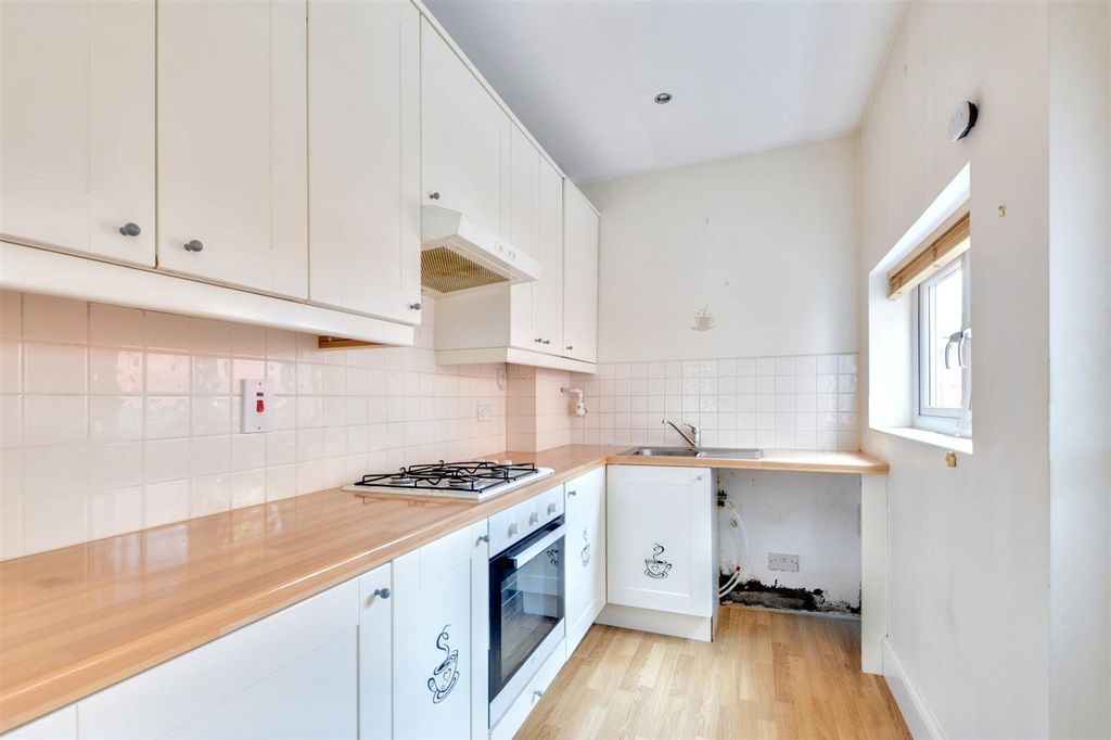 Property photo 3 of 13 Kitchen Area