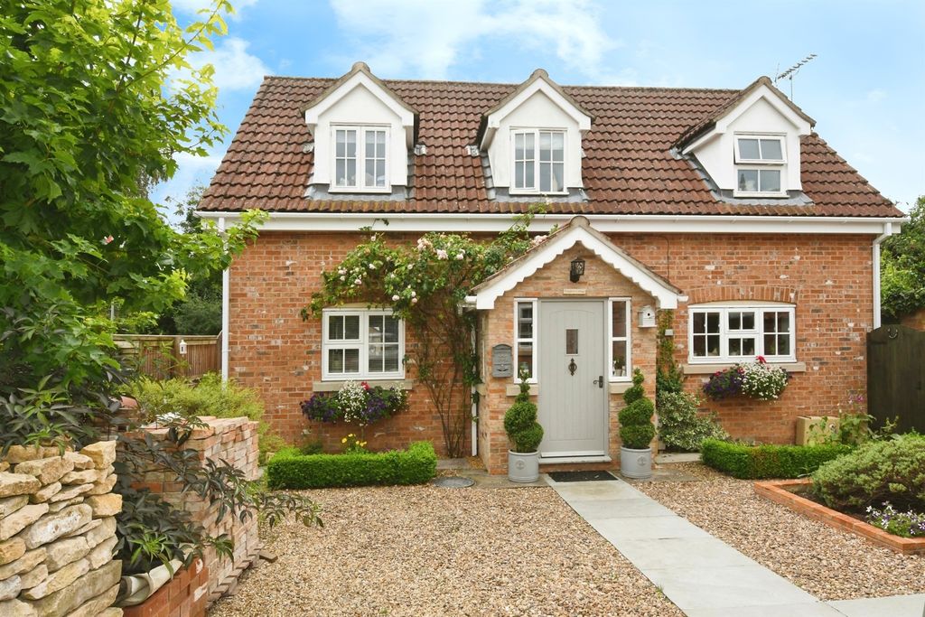 Property photo 1 of 16 Outside Front