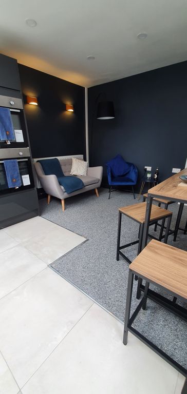 Property photo 3 of 6 A Stylish Communal Lounge Featuring Modern Furnish...