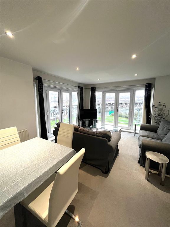 Property photo 2 of 15 Diningarealivingroom.Jpg