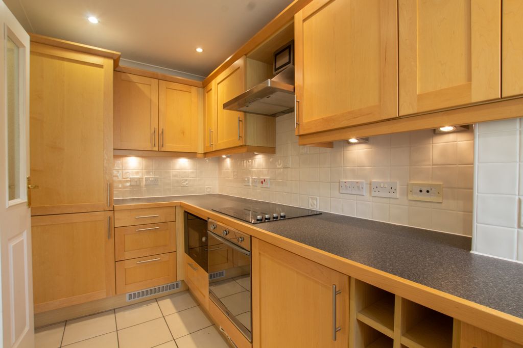 Property photo 3 of 12 Kitchen