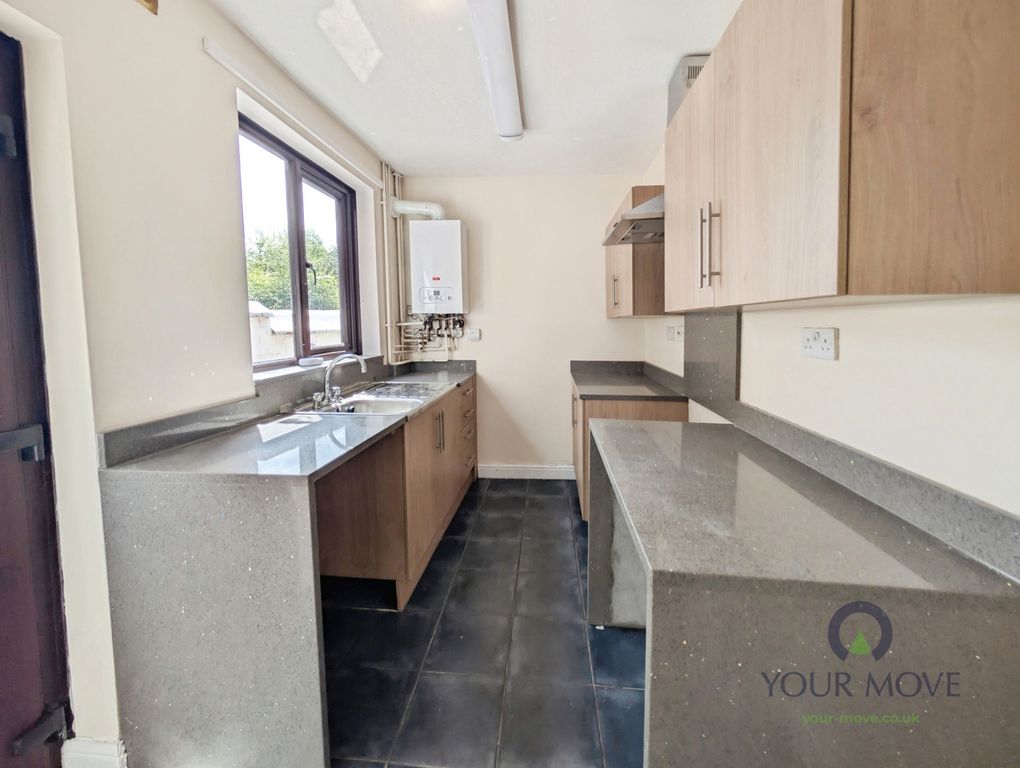 Property photo 3 of 7 Kitchen