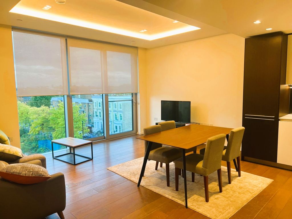 Property photo 2 of 8 Living Front