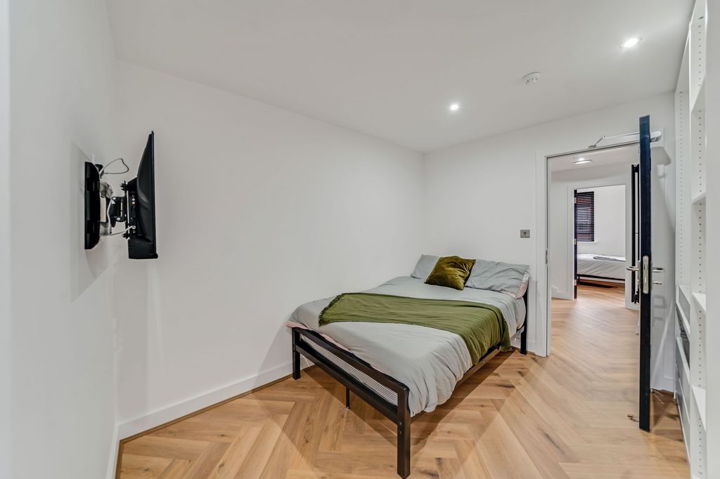 Property photo 3 of 3 A Tidy And Modern Bedroom Featuring A Comfortable ...