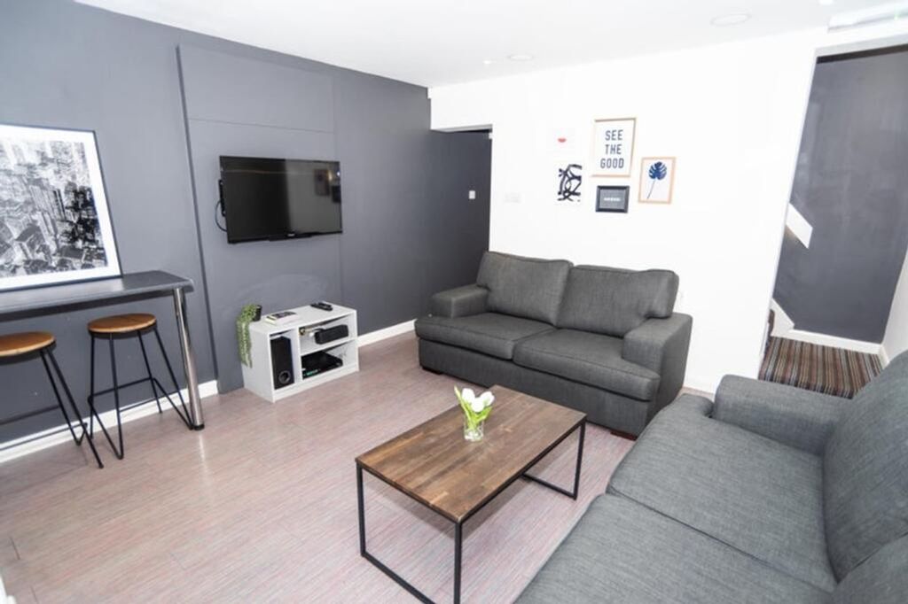 Property photo 3 of 12 A Stylish And Contemporary Living Room Featuring A...