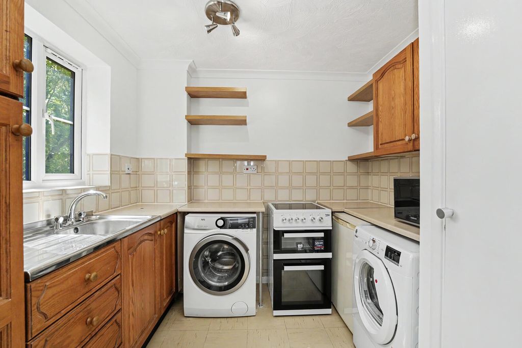 Property photo 2 of 14 Utility Room