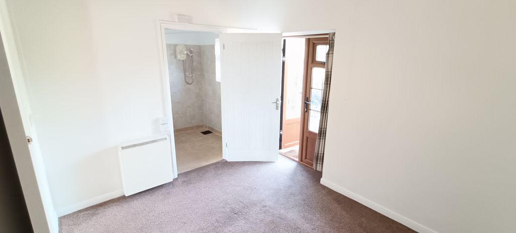 Property photo 2 of 10 Bedroom, View Of Bathroom & Garden Patio Doors