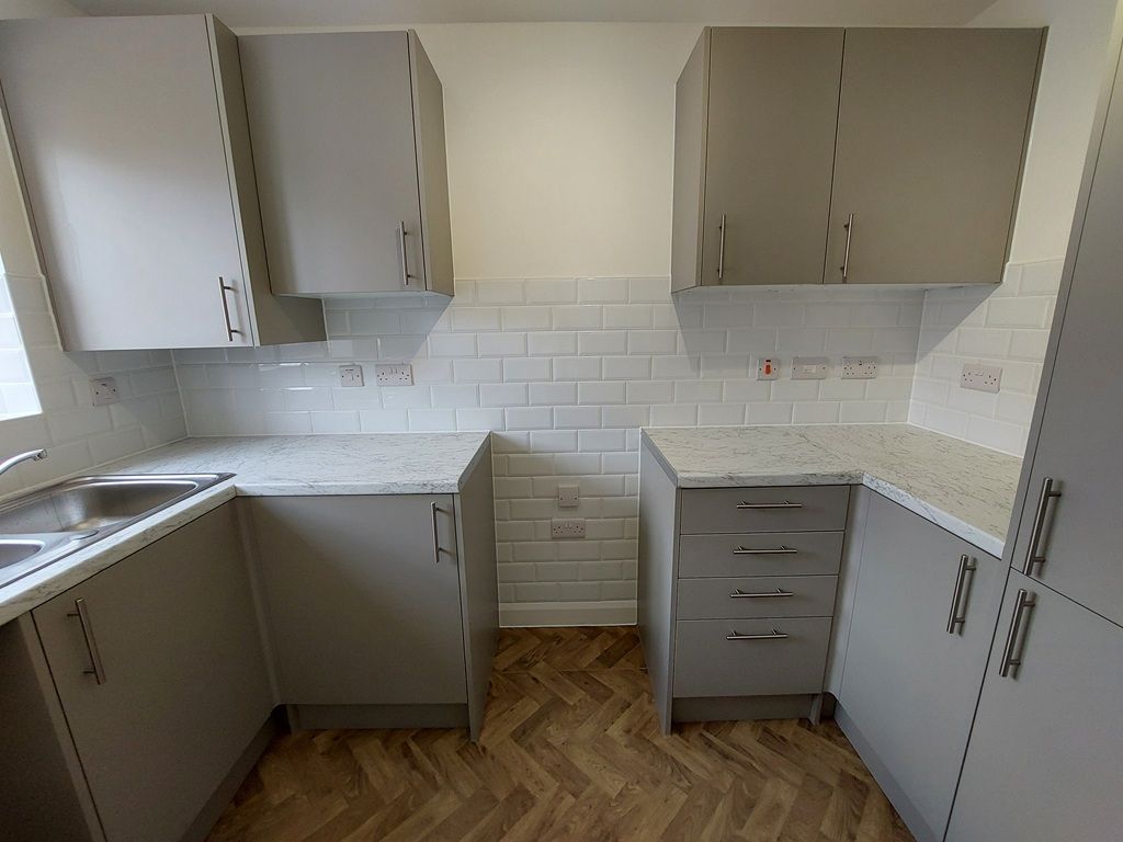 Property photo 3 of 15 Typical Kitchen