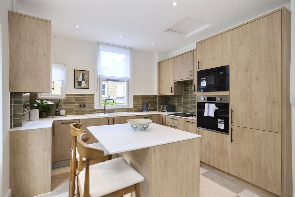 Property photo 3 of 16 Kitchen