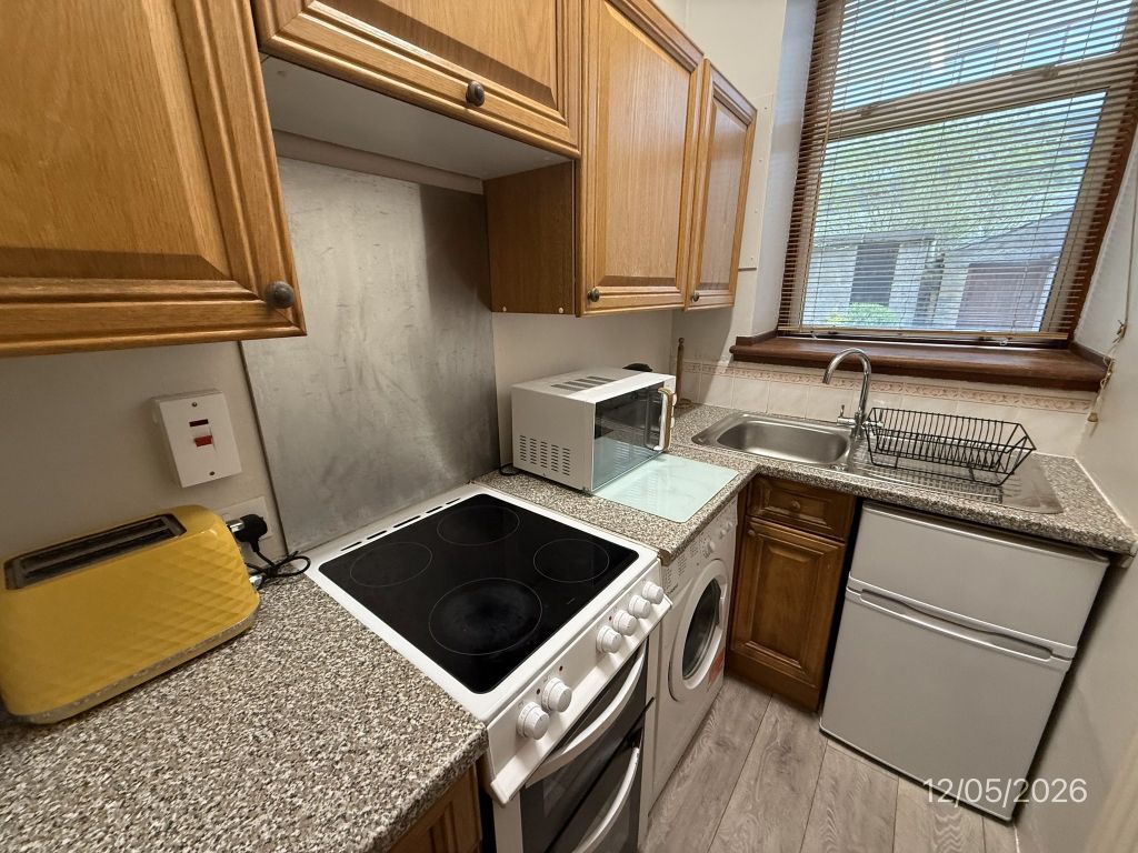 Property photo 2 of 9 Kitchen