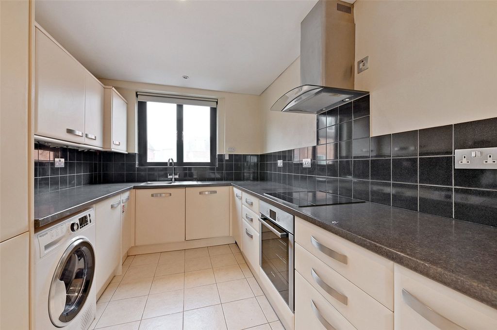 Property photo 3 of 13 Kitchen